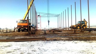 Аренда экскаватора погрузчика с ямобуром в Артем цена от 1554 руб